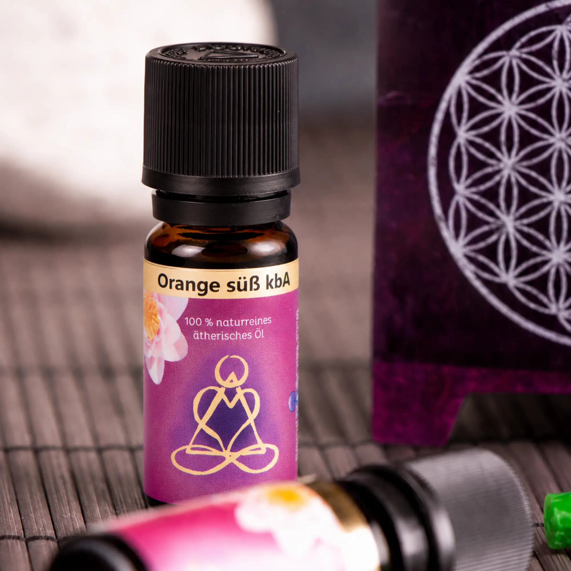 Ätherisches Öl Orange süß von Berk mit violetter Aromalampe