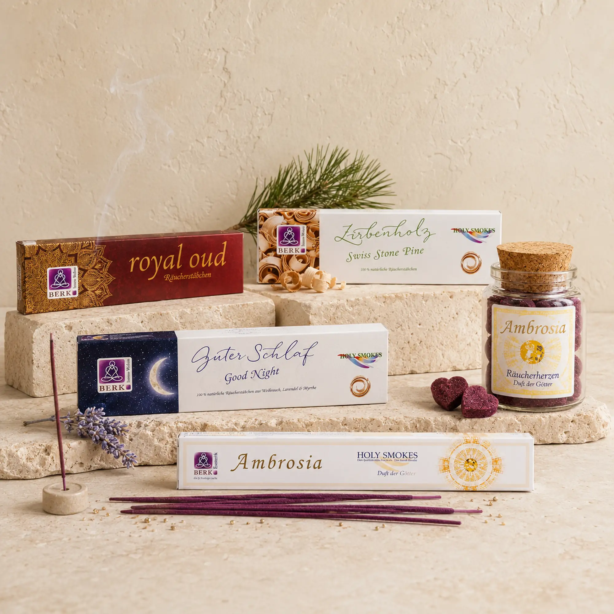 Fünf Berk Räucherdüfte mit Royal Oud, Guter Schlaf, Zirbenholz und Ambrosia auf hellem Naturstein